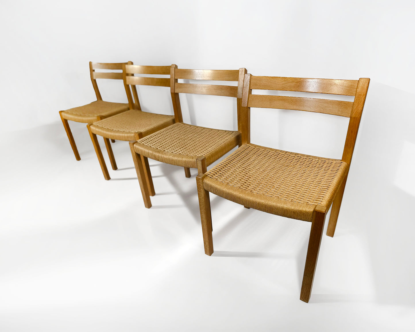 J.H. Møller Model 401 Oak Dining Chairs with Original Danish Papercord — Denmark, 1970s